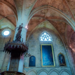 Gothic church interior with ribbed brick vaulted ceiling